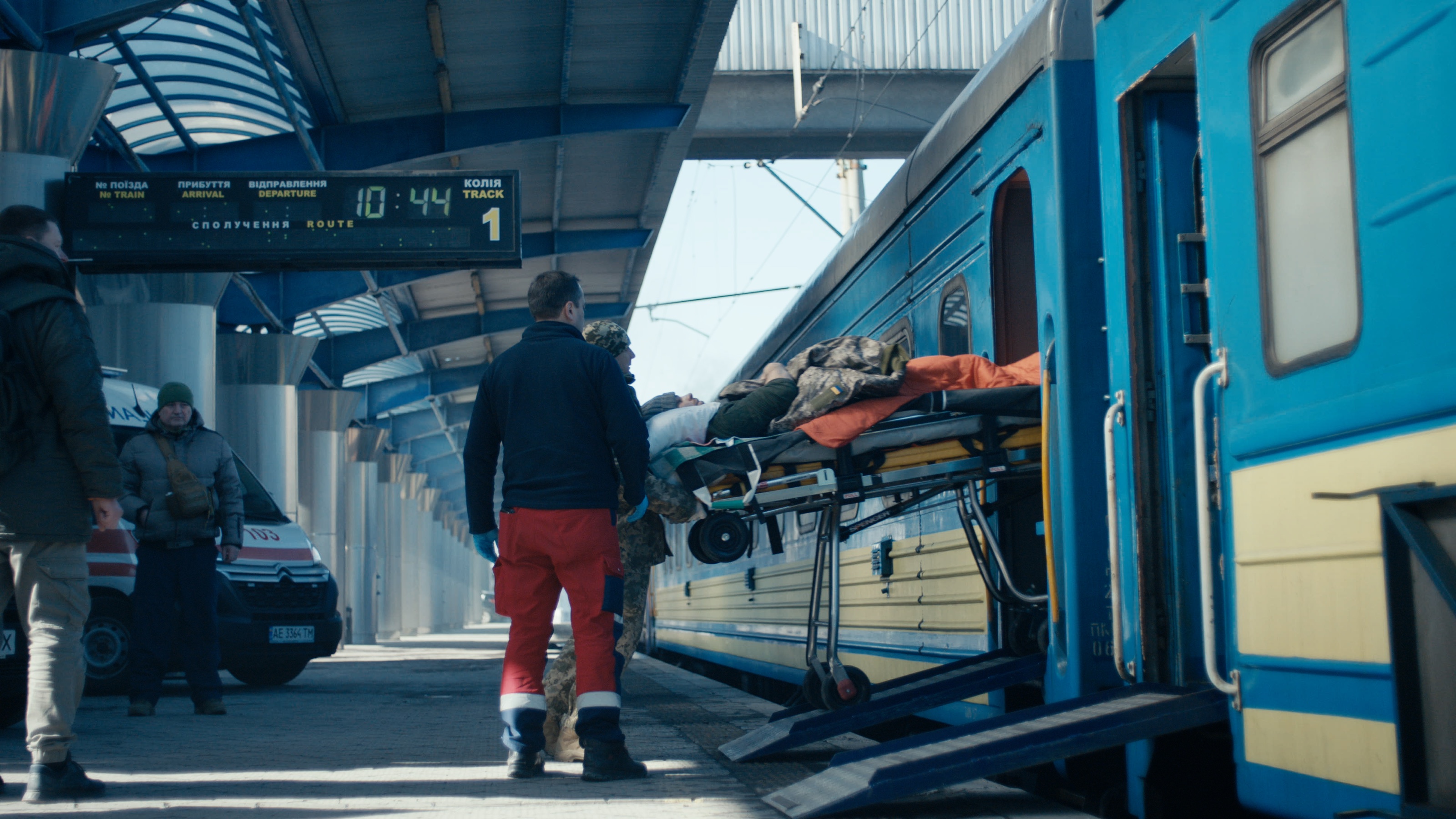 A stretcher is lifted aboard the medical train.